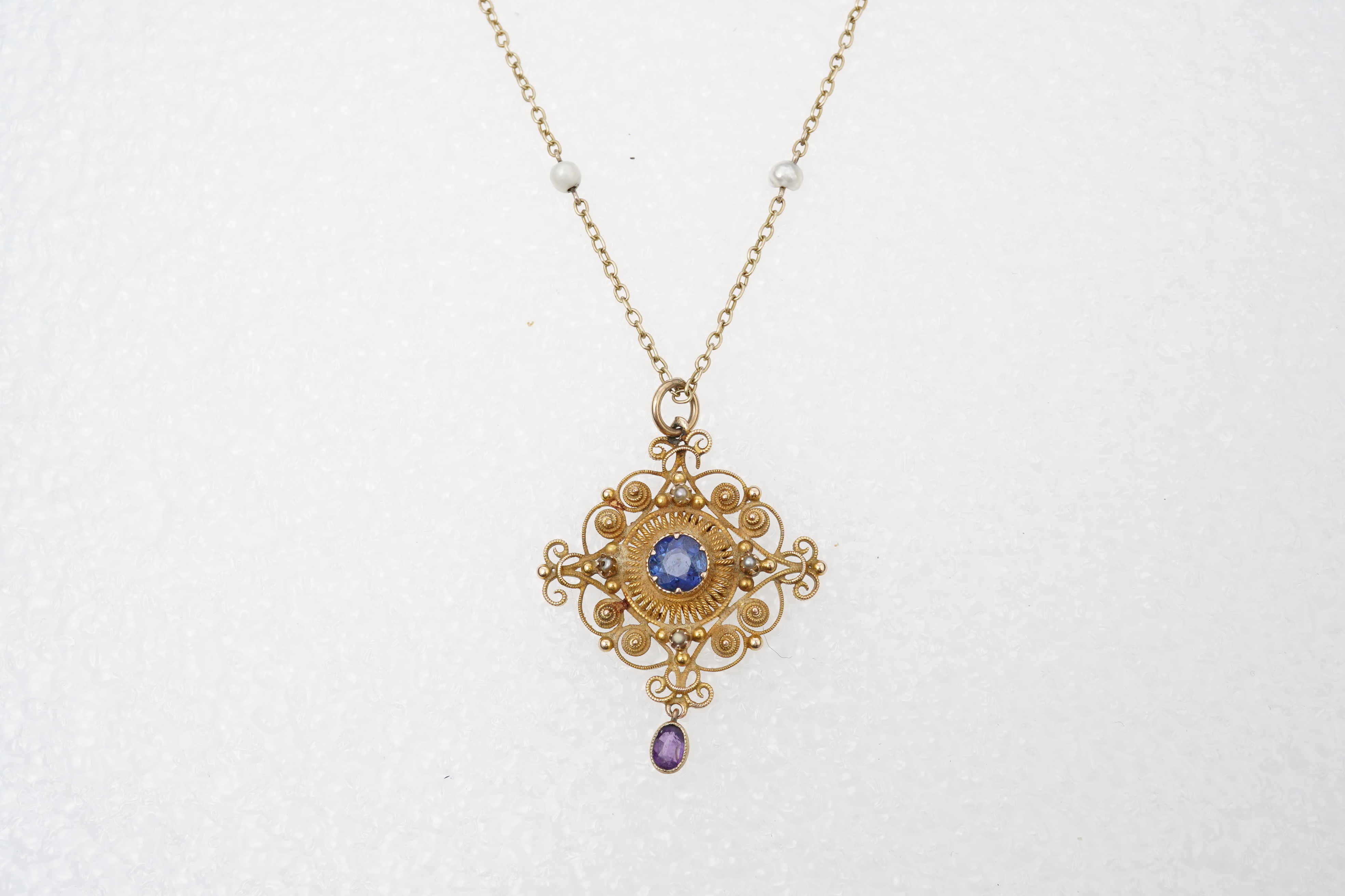 A sapphire, amethyst and pearl pendant necklace, late 19th century